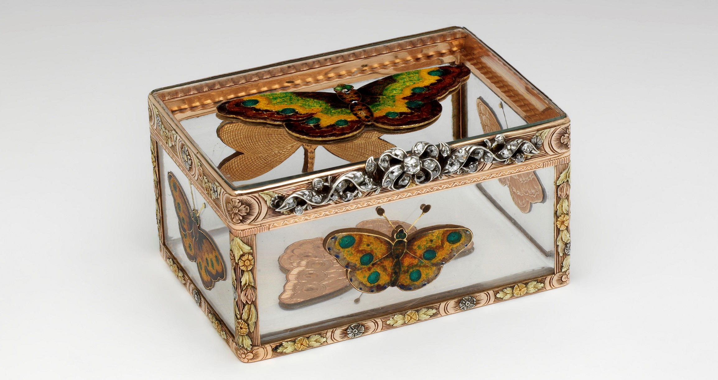 A gold and rock crystal snuffbox, with enamel butterflies