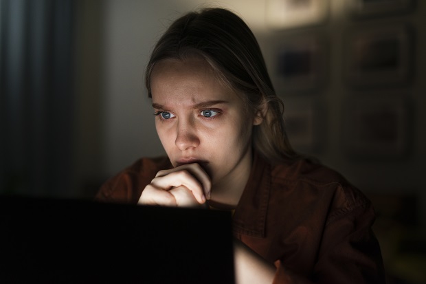 front-view-woman-working-laptop