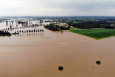 Aerial drone picture shows flooding from the Maas/La Meuse river in Maaseik, Friday 16 July 2021. (BELGA PHOTO ERIC LALMAND)