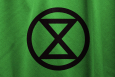 A flag bearing the logo of the activist group, Extinction Rebellion (Image: Wikipedia Creative Commons)