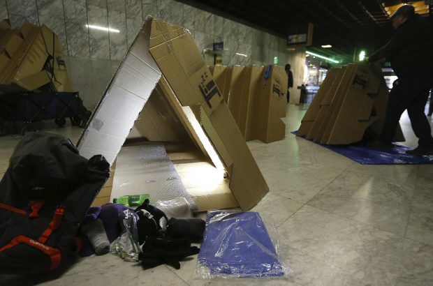 Illustration picture shows the presentation of the Orig-Ami cardboard shelter for homeless people, at the Brussels North Station, Friday 29 December 2017. The foldable cardboard triangle shaped shelter is designed and developed to help homeless people. BELGA PHOTO NICOLAS MAETERLINCK