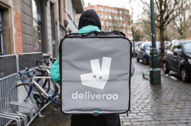 Illustration picture shows a Deliveroo courier in Brussels.(BELGA PHOTO PAUL-HENRI VERLOOY)