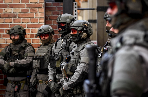 Illustration picture shows masked and equipped members of the Special Forces team of the federal police, in Brussels (BELGA PHOTO DIRK WAEM)