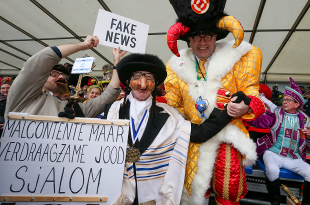 Aalst mayor Christoph D'Haese (R) and a Jewish caricature pictured during the yearly carnival parade in the streets of Aalst, Sunday 23 February 2020, starting on Sunday with the so-called Zondagsstoet. (BELGA PHOTO NICOLAS MAETERLINCK)