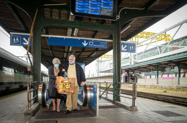 Illustration picture shows elderly travellers wearing a mouth mask as they arrive on the platform, at Gent Sint-Pieters railway station, Monday 04 May 2020 (BELGA). 