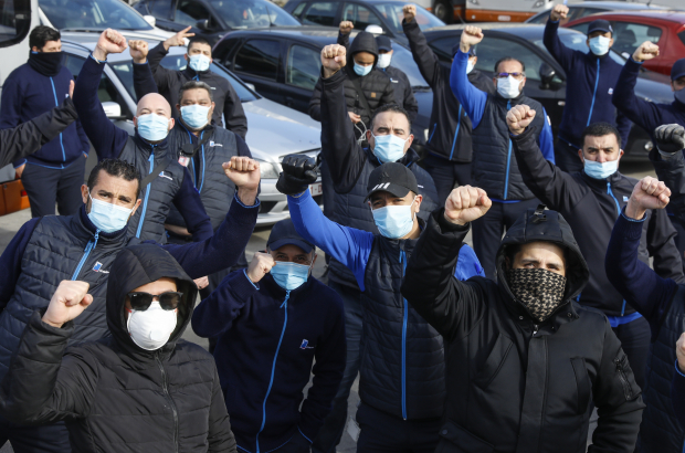 Illustration picture shows MIVB-STIB bus drivers protesting, wearing masks, at the Jacques Brel depot of STIB - MIVB Brussels public transport company as they started a spontaneous strike this morning, in Anderlecht, Monday 11 May 2020. (BELGA PHOTO THIERRY ROGE)