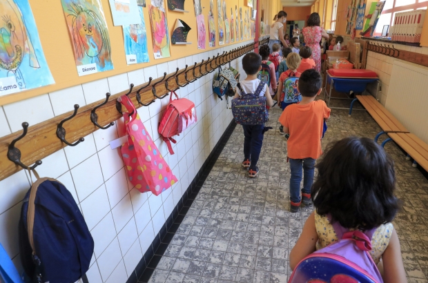 Illustration picture shows kids and their schoolbags in the hall outside their classroom, in a kindergarden school in Etterbeek, Brussels, Tuesday 02 June 2020. (BELGA PHOTO THIERRY ROGE)