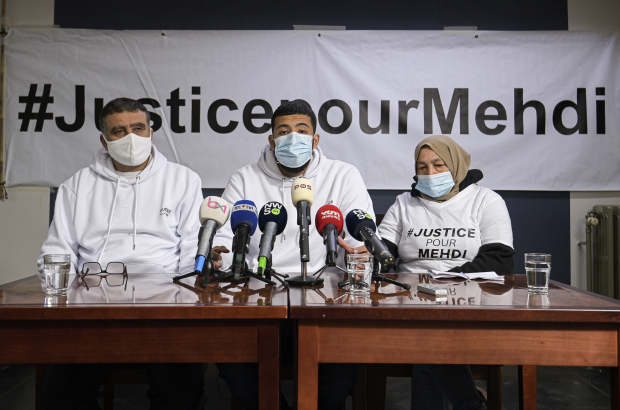 The victim's family - from left to right - the father Mohammed, the brother Ayoub and the mother Fatima pictured at a press conference of the parents of Mehdi Bouda, a 17-year-old boy who died after he was ran over by a police car in August 2019 in the city centre of Brussels, Thursday 08 October 2020. (BELGA PHOTO LAURIE DIEFFEMBACQ)