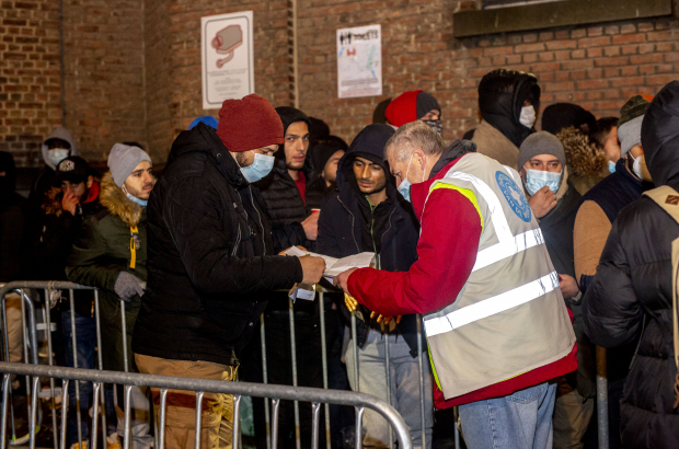 Illustration shows the conditions of waiting outside for asylum seekers in front of the 'Klein Kasteeltje - Petit Chateau' Fedasil registration centre for asylum seekers in Brussels, 01 December 2021. (BELGA PHOTO HATIM KAGHAT)