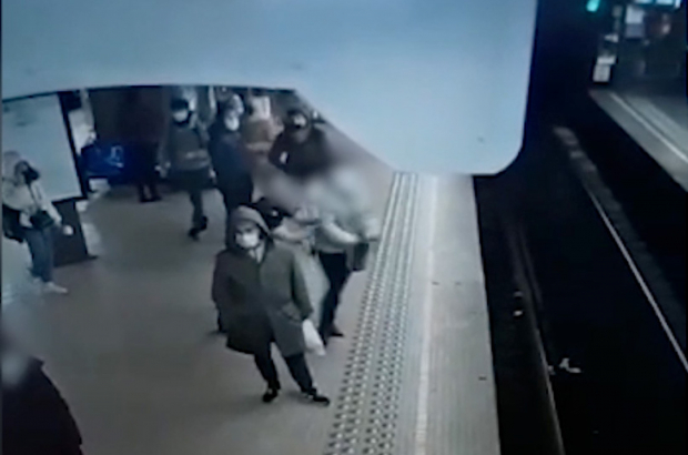 This screenshot taken from a video and distributed on Saturday 15 January 2022, shows a 55-year-old woman victim of a push incident on Friday 14 January 2022, by a 23-year-old French man, at Metro station Rogier, in the city centre of Brussels, Saturday 15 January 2022. (BELGA PHOTO STRINGER)