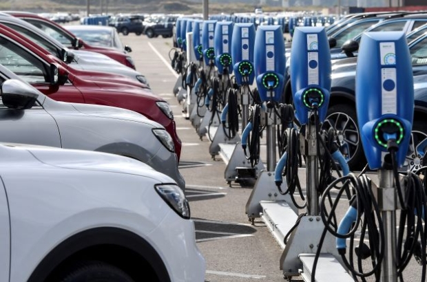 Electric cars at charging station at ICO in Zebrugge - Belga