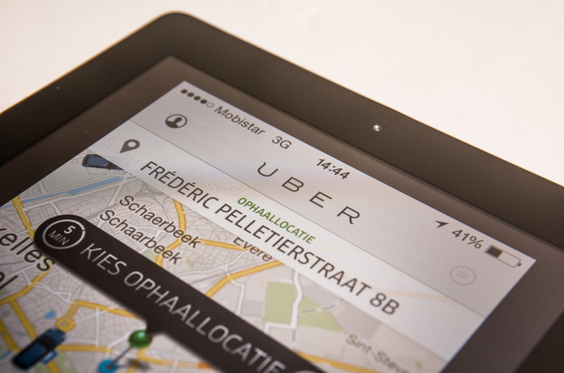 Illustration picture shows the Uber taxi application on an iPad. Uber will extend its services into Flanders from November 9. (BELGA PHOTO SISKA GREMMELPREZ)