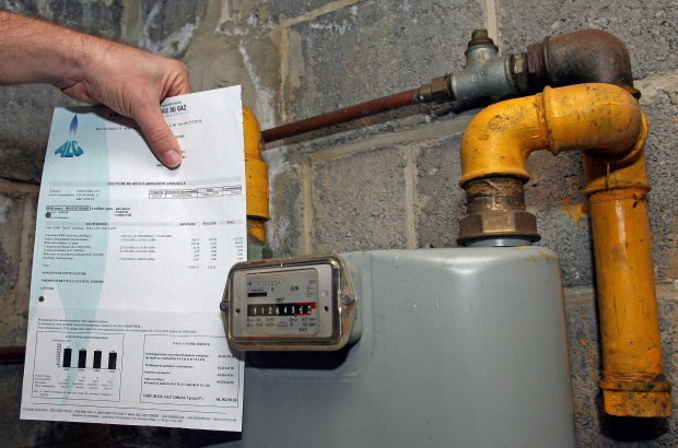 Illustration picture shows a bill in front of a gas meter (BELGA PHOTO MICHEL KRAKOWSKI)