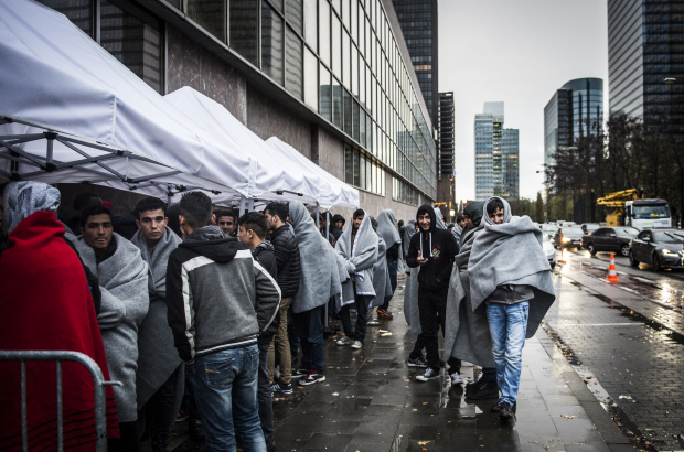 llustration picture shows refugees outside the WTC tower in Brussels where the Red Cross provides shelter for refugees. (BELGA PHOTO JASPER JACOBS)