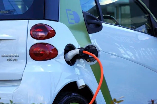 An electric car plugged into a charging point (free licence/RawPixel) An electric car plugged into a charging point (free licence/RawPixel)