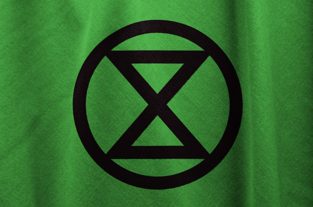 A flag bearing the logo of the activist group, Extinction Rebellion (Image: Wikipedia Creative Commons) A flag bearing the logo of the activist group, Extinction Rebellion (Image: Wikipedia Creative Commons)