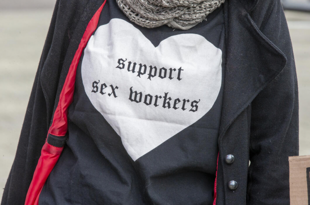A demonstration organized by the UTSOPI collective to protest against the closure of sex work activities, Sunday 07 March 2021, in Brussels. (BELGA PHOTO NICOLAS MAETERLINCK)