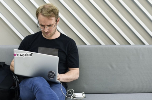 A man sits alone and works on his laptop (Google images) A man sits alone and works on his laptop (Google images)