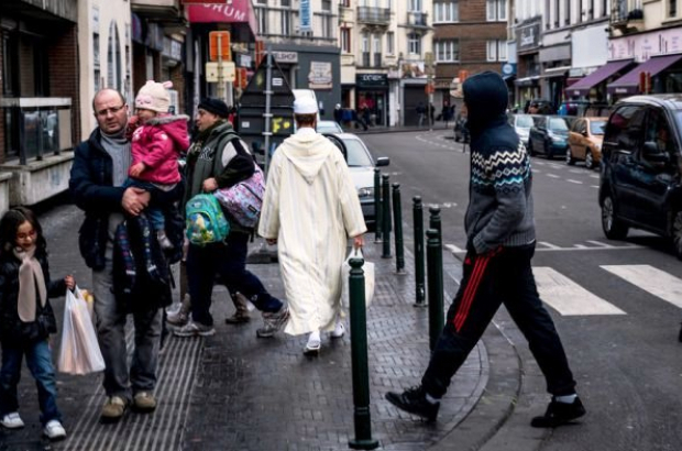 Residents of Molenbeek, Brussels, go about their daily lives (BELGA IMAGE)