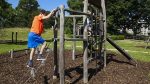 Children play on a playground in Brussels. (BELGA PHOTO THIERRY ROGE) Children play on a playground in Brussels. (BELGA PHOTO THIERRY ROGE)