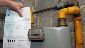 Illustration picture shows a bill in front of a gas meter (BELGA PHOTO MICHEL KRAKOWSKI)