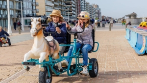 Illustration shows children enjoying nice weather at Belgian coast, in Nieuwpoort, during the eastern school vacation, Tuesday 12 April 2022. (BELGA PHOTO KURT DESPLENTER)