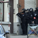 Special forces pictured on the scene of a police raid in Brussels. (BELGA PHOTO LAURIE DIEFFEMBACQ)