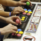 Video gamers play on an arcade console (BELGA PHOTO NICOLAS MAETERLINCK)