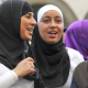 Illustration picture shows a group of Muslim girls wearing head scarves, talking together (BELGA PHOTO LUC CLAESSEN)