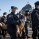 Police arrest a climate activist outside the Royal Palace in Brussels, Monday 21 September 2020, (BELGA PHOTO BENOIT DOPPAGNE)