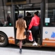 Passengers in Brussels board an STIB bus through the middle doors in compliance with health restrictions which meant front doors were shut. (BELGA PHOTO NICOLAS MAETERLINCK)