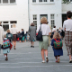 Pupils with parents seen prior to enter their classes,as school starts after summer holidays in Brussels. (BELGA PHOTO?