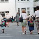 Pupils with parents seen prior to enter their classes,as school starts after summer holidays in Brussels. (BELGA PHOTO?
