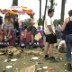 Music fans pictured between a lot of rubbish on the last eve of the "Rock Werchter" open air festival in Werchter. (BELGA PHOTO OLIVIER MATTHYS)