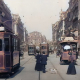 A screenshot taken from the colourised video shows trams and pedestrians on Boulevard Anspach, Brussels, in 1908 (YouTube / Rick88888888 / Prelinger Archive)