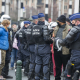 Riot police arrest protesters at an unauthorized protest demonstration against the curfew organized by the association 'Vecht voor je recht', in front of the Brussels Central Station, in the city centre of Brussels, Sunday 31 January 2021. (BELGA PHOTO NICOLAS MAETERLINCK)