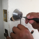 A locksmith opens a door using their tools (Creative Commons licence, Edward Paul/Pixabay)