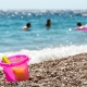 A seaside scene of swimmers on summer holiday (Max Pixels/Free licence)